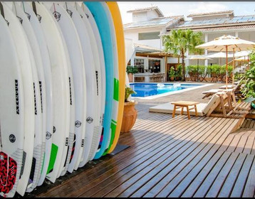 Imagem 1 da galeria do parceiro Surf's Up Club Arte da Tribo Hostel & Camping - Praia do Rosa