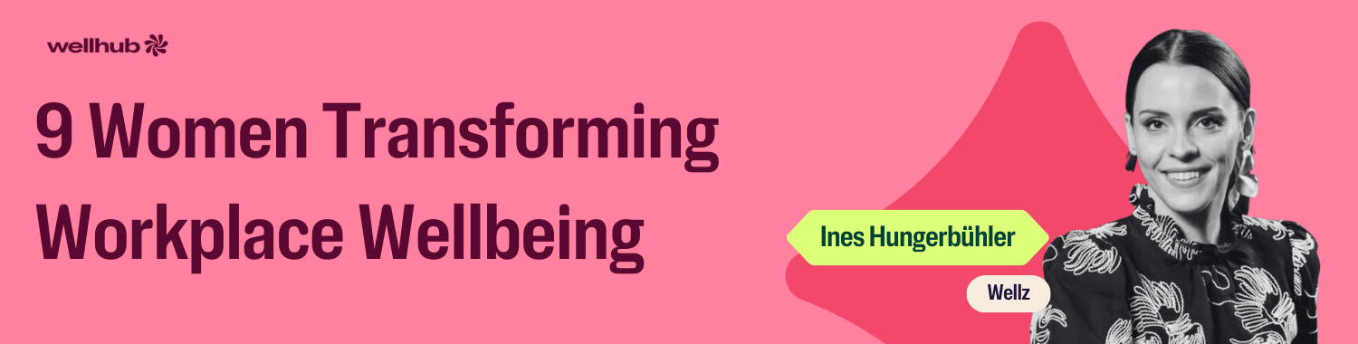 Banner reading “9 Women Transforming Workplace Wellbeing” featuring a black-and-white portrait of Ines Hungerbühler from Wellz on a pink background with Wellhub logo.