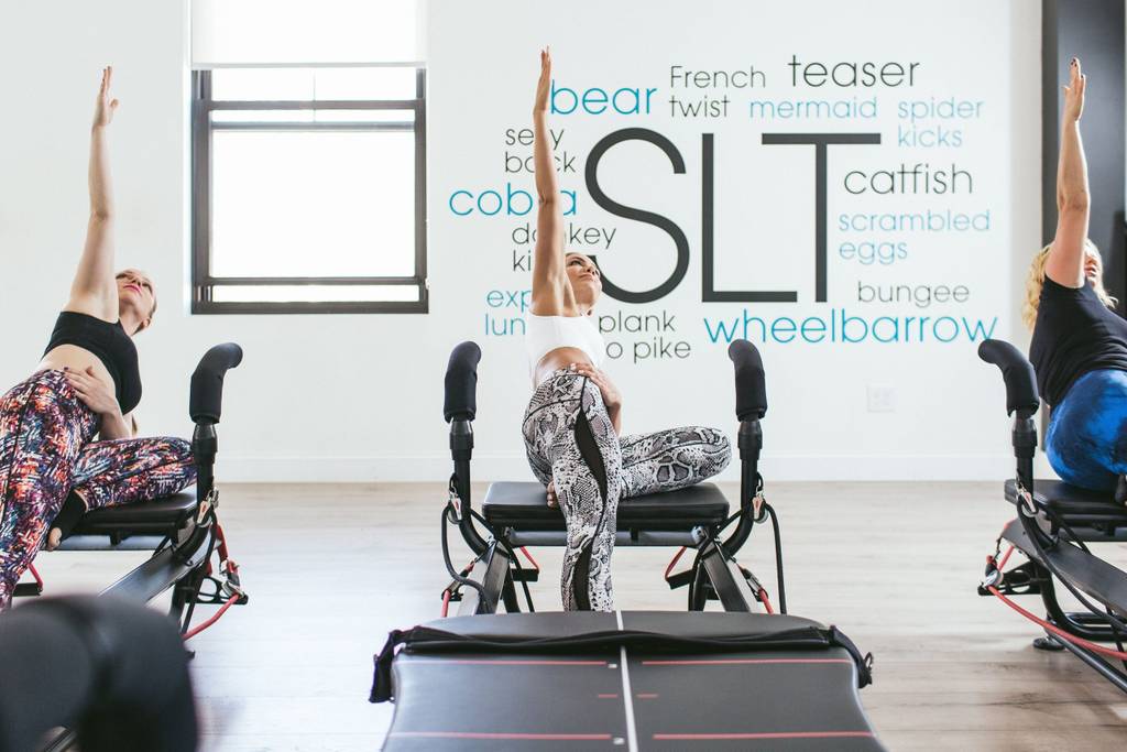 Often referred to as “the hardest workout in NYC,” SLT stands for strengthen, lengthen, & tone. Learn what to expect before your first class.