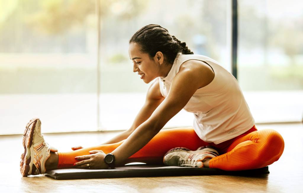 What is dynamic stretching? Wellhub chatted with Keren Day, co-founder of Racked Stretch, to answer all of your stretching questions.