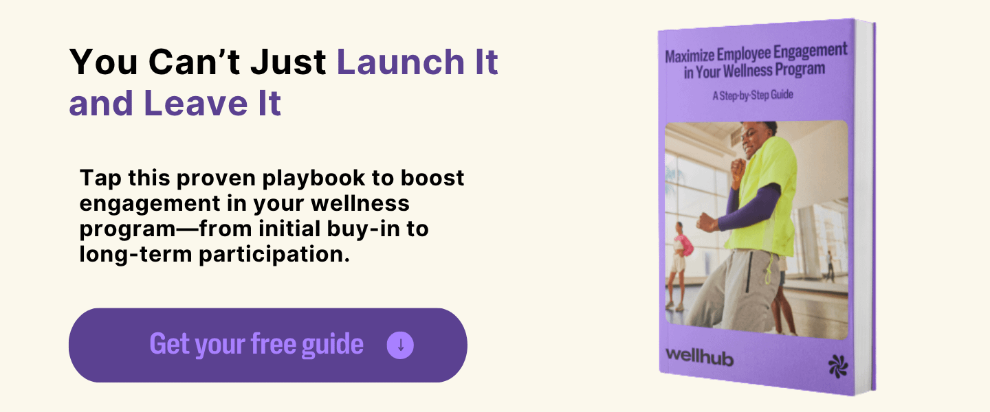 Banner promoting a free guide titled “Maximize Employee Engagement in Your Wellness Program,” featuring a call to action: “You Can’t Just Launch It and Leave It.” Includes a purple book cover and a button that says “Get your free guide.”