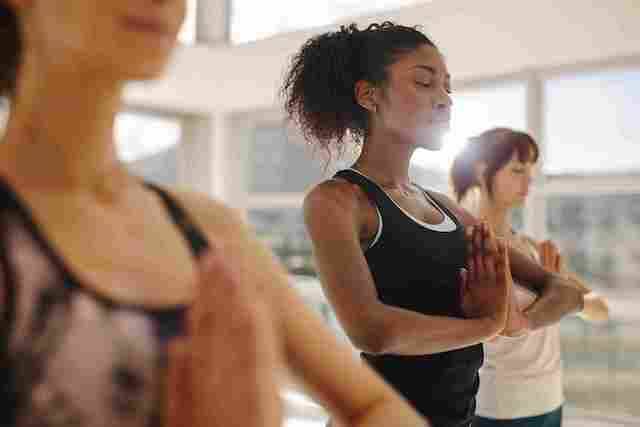 women doing yoga pose