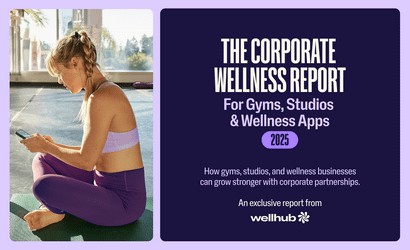 Woman sitting on a yoga mat using her phone, next to a Wellhub banner about the 2025 corporate wellness report.